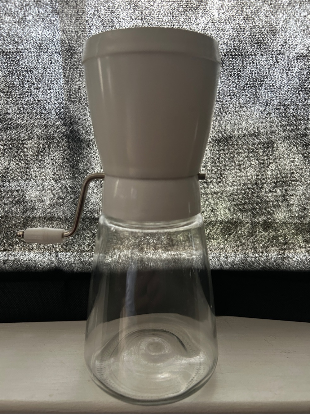 Manual Coffee Grinder with White Top and Clear Glass Carafe